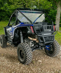 High Clearance Boxed Rear Radius Arms For Honda Talon 1000X And 1000X 4 2019 2020 Models With Seven Eighths Inch Adjustable Heim Joints High Strength Alloy Steel And Zinc Plated Chromoly Bushings For Tougher Smoother Handling. Rear view of Honda Talon with lifted suspension