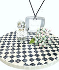 Lazy Susan Organizer With Boho Checkered Mother Of Pearl Inlay 12 Inch Rotating Tray displaying perfume and decor