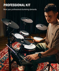 Man playing electric drum set for adults full size that feels pro with 10 inch quiet mesh pads 12 inch crash cymbals 100 kits