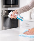 Person using Ceramic Coating Spray Kit For Kitchen And Bathroom Surfaces That Repels Stains Smudges Water Spots And Soap Scum Ultra