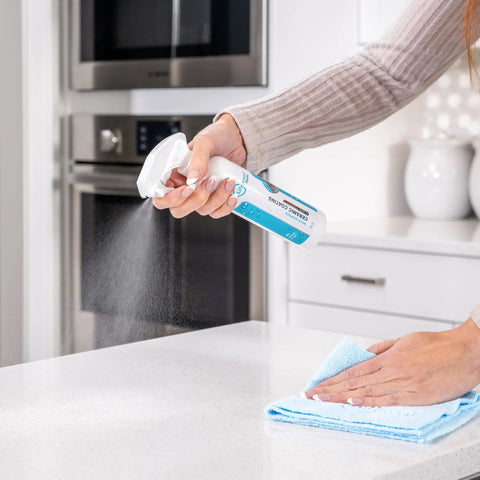 Person using Ceramic Coating Spray Kit For Kitchen And Bathroom Surfaces That Repels Stains Smudges Water Spots And Soap Scum Ultra