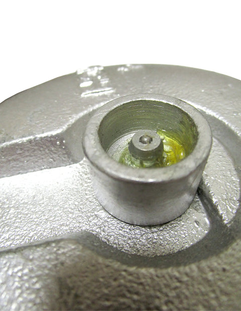 3 Ton Yarding Block With Shackle And Pin Built Tough, 4 Inch Galvanized Sheave Pulley With Grease Fitting For Three Eighths Inch Cable, Nylon Lock Nut On Sheave Bolt, Heavy Duty Rigging Workhorse For Real World Jobs close-up of grease fitting