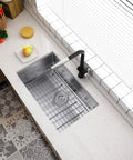 Overhead view of 28-inch undermount kitchen sink with deep 10-inch basin, premium 304 stainless steel, in modern kitchen.