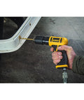 Pneumatic Drill 3/8 Inch Workhorse With Quick Change Keyless Chuck Reversible 2100 RPM drilling into metal surface