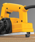 Beast Five Point Five Amp Hand Planer with Three and a Quarter Inch Cutter Aluminum Shoe on wooden surface.