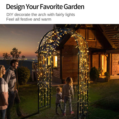 Family under a lit Durable Curved Metal Garden Arbor Trellis For Outdoor Use, perfect for climbing vines and festive decor