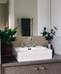 20 Inch Rectangular Ceramic Vessel Sink With Overflow For Above Counter Dope White Porcelain, Pop Up Drain And Widespread Faucet Holes on modern bathroom counter.