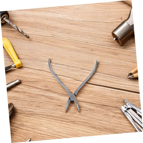 Stainless Steel Eyeglasses Repair Tool With Angled Pliers For Adjusting Frames on a wooden surface with other tools visible