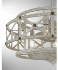 Top Shelf Fandelier Ceiling Fan With Six Bright Bulbs And Dead Simple Controls Measuring 16 By 29 Inches In Distressed White Styled With Subtle Gold Trim For A Smooth Upgraded Vibe close-up of fan blades and bulb holders.