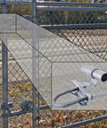Rolling Gate Track Bracket For One Five Eighths Inch Fence Posts And One Five Eighths Inch Track Rail installed on gate