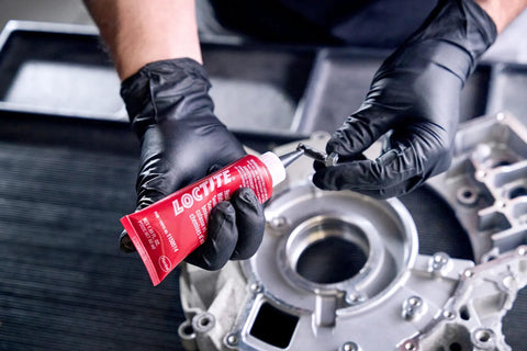 Applying head bolt and water jacket sealant for automotive engines with OEM approved performance to fasteners during assembly