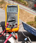 Mini USB Solar Panel Module 2W 6V With Blocking Diode connected to multimeter outdoors