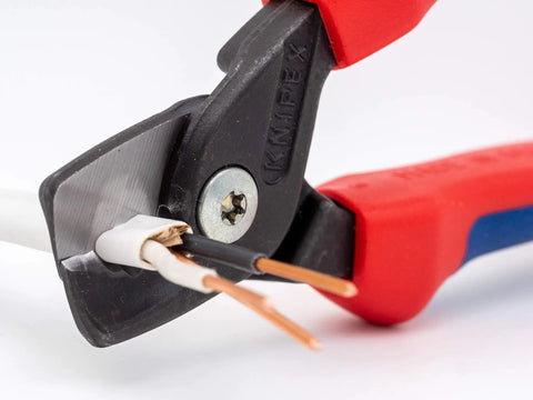 Close-up of StepCut Cable Shears cutting multi-core copper wire, 6.25-inch tool, designed for non-ferrous wire cutting with less effort.