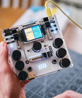 DIY DJ Mixer Kit For Beginners Teens Build Your Own DJ Board Learn Electronics Mix Tracks Add Effects Play Music Via SD Card Kid Friendly STEM Project That Feels Like Real DJing, handheld clear acrylic mixer with screen and knobs