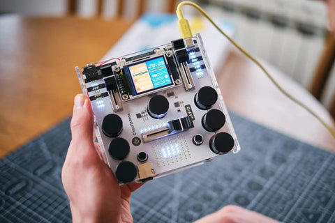 DIY DJ Mixer Kit For Beginners Teens Build Your Own DJ Board Learn Electronics Mix Tracks Add Effects Play Music Via SD Card Kid Friendly STEM Project That Feels Like Real DJing, handheld clear acrylic mixer with screen and knobs