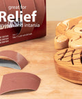 Front view: emery cloth sandpaper rolls in boxed multi-roll dispenser; grits 150–600 for woodturning and metalwork