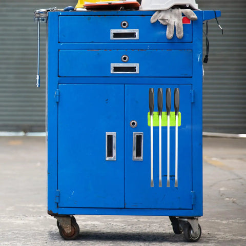 Magnetic Four Slot Pry Bar Holder With Mounting Holes Non Marring TPEE Low Profile Design on blue workshop cabinet
