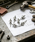 Mandrel Pop Rivets Kit With 4 By 5 Eighths Inch Assorted Sizes on workshop table with tools and blueprint
