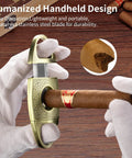 Hands holding a V Cut Cigar Cutter With Zinc Alloy Blade And Stainless Steel Guillotine For A Clean Smooth 21mm Cut Every Time