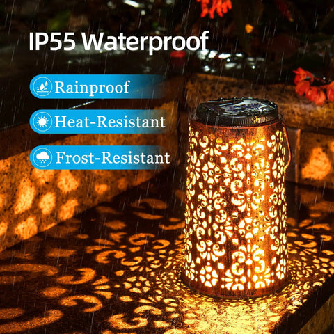 Two Pack Solar Hanging Lanterns Outdoor Lights With IP55 Waterproof Rating illuminated on wet stone surface