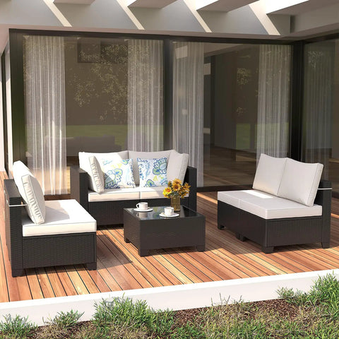 7 Piece Wicker Patio Furniture Set With Waterproof Cushions, Outdoor Conversation Couch Set on a wooden deck