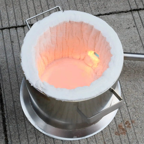 Heavy Duty Ceramic Fiber Insulation Blanket For Wood Stove Fireplace And Pizza Oven High Temperature Thermal Wrap inside a silver pot.