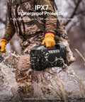 Person carrying a Rugged Outdoor Bluetooth Speaker IPX7 Waterproof, 90W Peak Power, in water with floating design, outdoor gear.