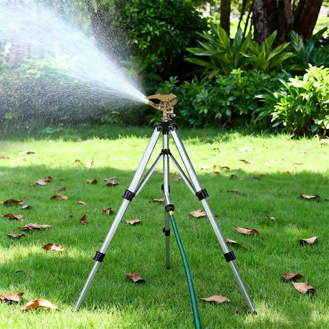 Heavy Duty Tripod Sprinkler Head Kit With 360 Degree Coverage for Lawn shown spraying water on grass with zinc alloy construction