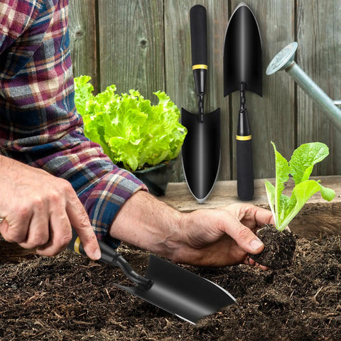 Man using 8 Piece Garden Hand Trowels Set With Pro Grade Heavy Duty Carbon Steel Shovels And Resin Rubberized Handles for planting.