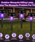 12 Pack Solar Bug Zapper Outdoor Waterproof Mosquito Killer Lamp For Patio Yard Garden installed in a yard with purple lights