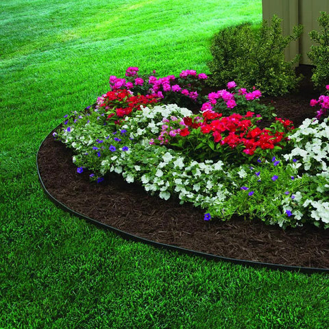Landscape with No Dig Landscape Edging Kit, 100 Ft Flexible Black Border With 32 Anchoring Spikes bordering vibrant flower bed.