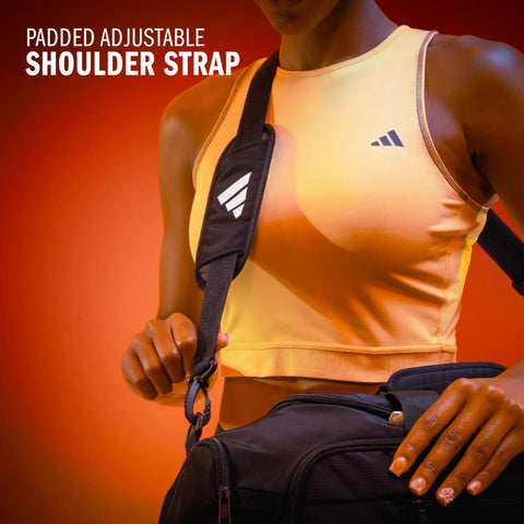 Person wearing Defender 5 Duffel Bag Built For Sports, Gym And Travel with padded adjustable shoulder strap