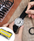 Person using 200 Pcs Watch Gasket Kit With Assorted O Rings For Back Case Repair 0.5 And 0.6mm 16-30mm Rubber Seals on watch