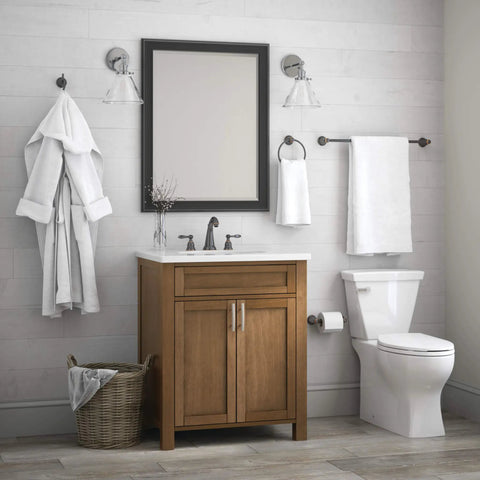 Bathroom with Kinla Oil Rubbed Bronze Toilet Paper Holder Wall Mount Single Roll Spring Loaded 3.26 Inch Extension next to toilet.
