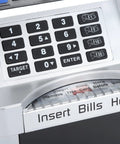 Close-up of Cool Kids ATM Piggy Bank keypad with debit card slot, showcasing automated money counting and note slot.