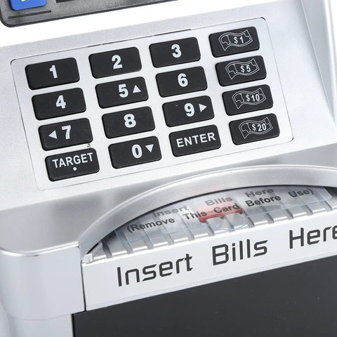 Close-up of Cool Kids ATM Piggy Bank keypad with debit card slot, showcasing automated money counting and note slot.