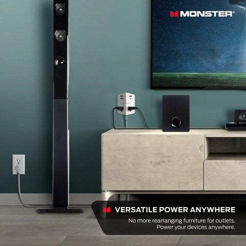 Power Shield XL Surge Protector With Outlet Extender on a console with home electronics, wall-mounted for versatile charging.