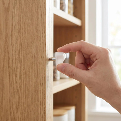 Installing a shelf pin from the 200 Pack Shelf Pins And Supports With Enhanced Grip For Kitchen Cabinets And Furniture Durable Plastic And Stainless Steel Holders For Glass Or Wood Shelves Easy Install Safe Stable No Slippage Ideal For Home Office