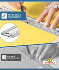 12 Inch Aluminum Ruler With Dual Inch And Metric Scales, Precise Markings, tilted for visibility, in use on yellow paper