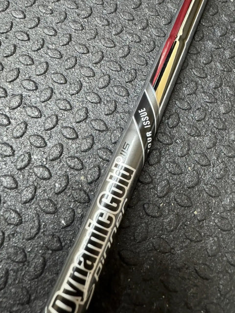 Dynamic Gold Tour Issue VSS Spinner 115 Wedge Flex Shaft.355 inch black golf shaft close-up on textured surface