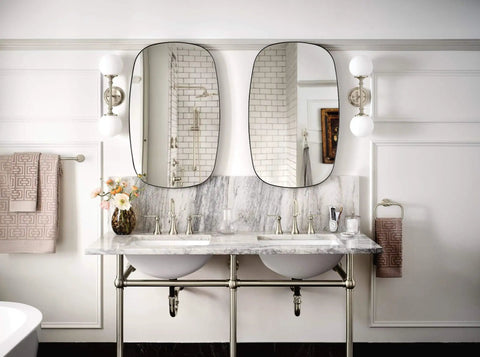 Bathroom with dual sinks, two oval mirrors, marble countertop, and Colinet Traditional 24-Inch Towel Bar in Brushed Nickel for Bathroom or Kitchen.