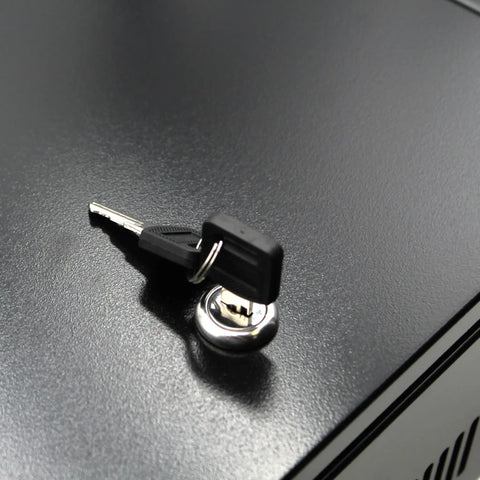 Key resting on a lock for Bulletproof 2U Wall Mount Network Cabinet Featuring Lockable Solid Door And Heavy Gauge Black Steel Frame.