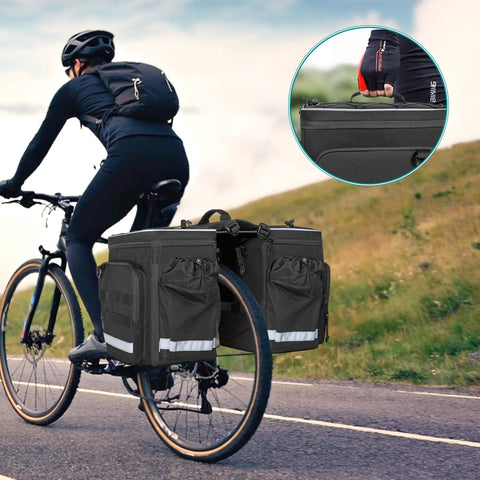 Cyclist using 50L Expandable Rear Rack Bike Bag with Rain Cover and Pockets, Water Resistant Saddle Panniers for Commuting Black