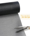 Pet Proof Window Screen Replacement 48 By 100 Inches Thick Charcoal Fiberglass Mesh For Sliding Pet Screen Doors being cut