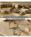 Four Piece Heart And Star Carabiner Keychain Clips In Gold And Silver Durable Alloy For Crafts Bags And Charms With Smooth Spring Loaded One Handed Opening.