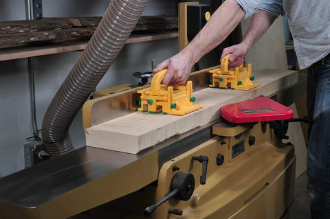 Man using Double Pack Pro Model GR-420 with two advanced GRR-Ripper safety tools and handle bridge kits on a table saw