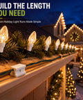 Badass 50 Pack Of Spt-1 Vampire Plugs For Christmas Light Wire Connectors And Diy Splice Cords Indoors Or Outdoors Powers Up String Lights With Zero Hassle In Bright White on a decorated house roof.