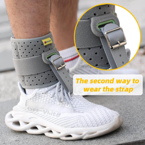 Gray Drop Foot Ankle Brace Orthosis with cushioned comfort and adjustable wrap on foot, showing second strap method for improved gait.