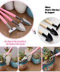 Close-up of 24 Piece Mini Garden Tools Kit For Succulents And Fairy Gardens with pink handles and stainless steel heads.