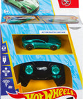 Packaging of Remote Control Aston Martin Vantage RC Car 1 64 Scale with remote and teal vehicle in box.